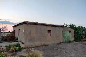 Terreno e casa rurale