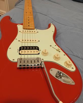 fender Stratocaster player plus Fiesta red 