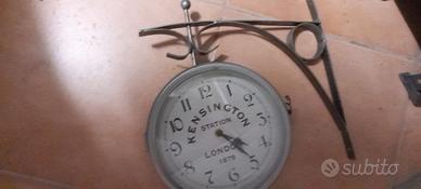 orologio doppia faccia da parete