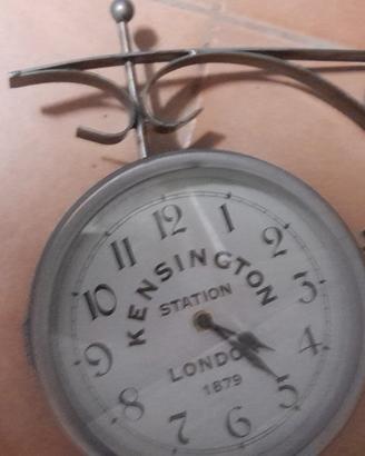 orologio doppia faccia da parete