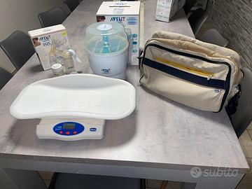 Bilancia, tiralatte,, sterilizzatore e sacca