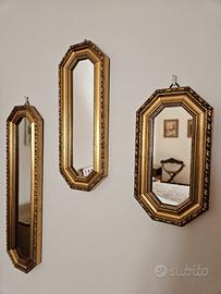 3 specchi con cornici dorate