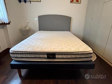 Letto piazza e mezzo con rete a doghe materasso