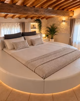Letto matrimoniale rotondo artigianale vera pelle