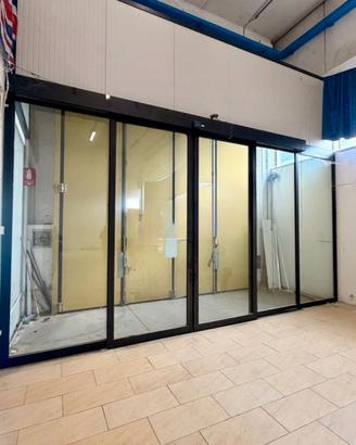 Porta scorrevole automatica in vetro FAAC – 5,87 m
