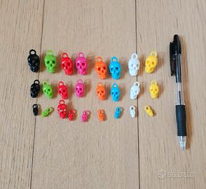 Collezione completa ciondoli teschietti edicola