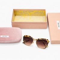 Occhiali da sole miu miu