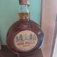 Oro Pilla brandy 1964  mai aperta con sigillo orig