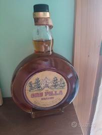 Oro Pilla brandy 1964  mai aperta con sigillo orig