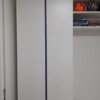 Letto a scomparsa  con armadio per ragazzo.