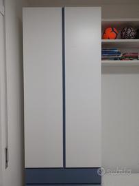 Letto a scomparsa  con armadio per ragazzo.