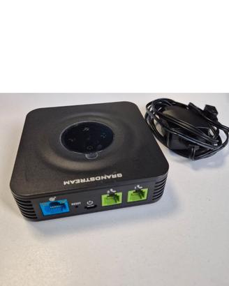Adattatore VoIP Grandstream HT802, come da foto.