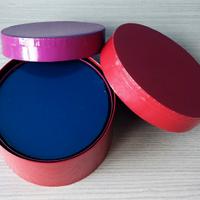 7 scatole rotonde colorate