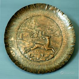 piatti in  rame sbalzato