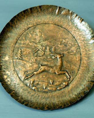 piatti in  rame sbalzato