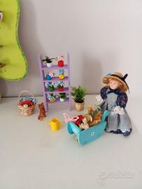 Bambolina fioraia in ceramica accessori miniatura