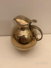 Brocca vintage bagnata in argento