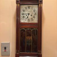 Orologio a dondolo a parete antiquariato