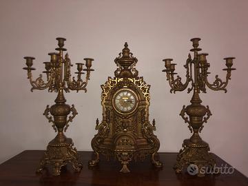TRITTICO OROLOGIO E CANDELABRI
