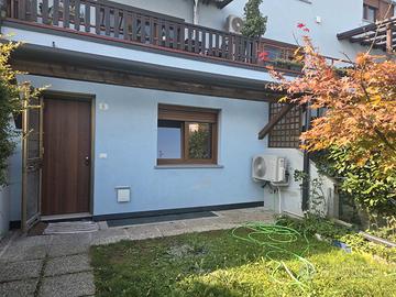 Trilocale arredato con giardino