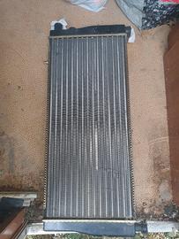 radiatore NUOVO peugeot 205 1.9gti con clima