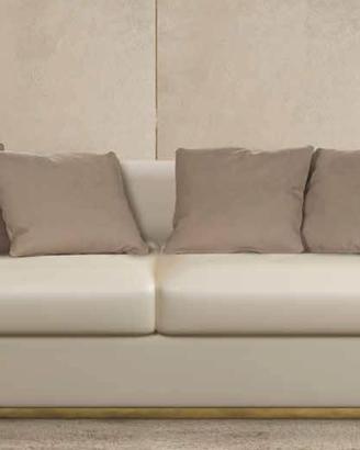 DIVANO CON DETTAGLI METALLO DORATO