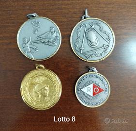 Lotto di medaglie a tema sportivo come da foto 