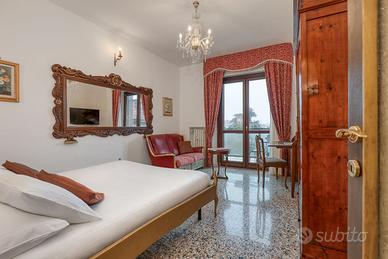 Suite con terrazzo su Piazzale della Stazione