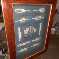 quadro con nodi e vascello in legno in rilievo