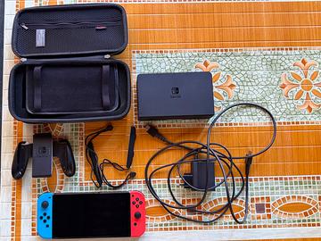 Nintendo switch oled + custodia + 4 giochi