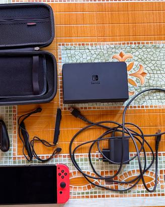 Nintendo switch oled + custodia + 4 giochi