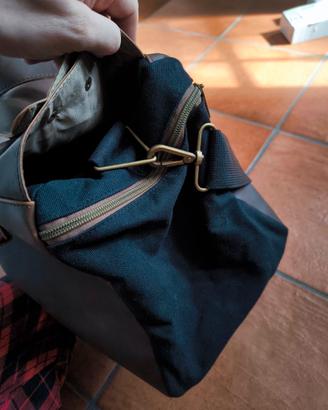 Borsa da viaggio in similpelle mai usata