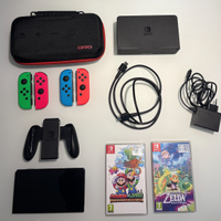 Nintendo switch OLED + 4 joy-con + 2 giochi
