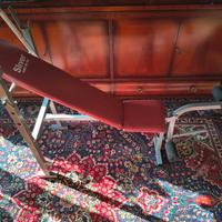 Panca regolabile con bilanciere e dischi