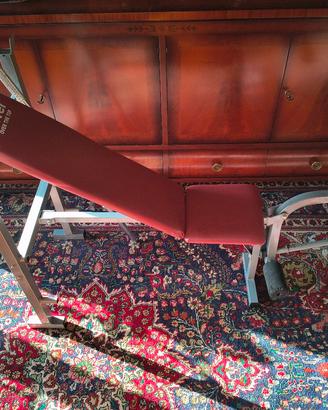 Panca regolabile con bilanciere e dischi