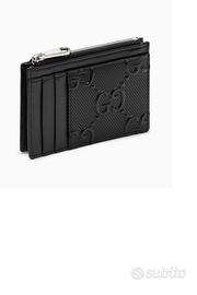 Portacarte Gucci con rilievo GG