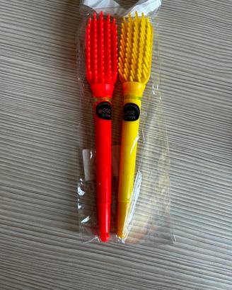 Coppia di pettini multigioco colorati