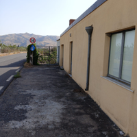 Terreno con casa su strada x villeggiatura