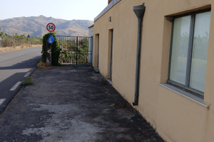 Terreno con casa su strada x villeggiatura