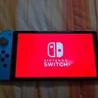 Nintendo Switch Oled + videogiochi e acessori