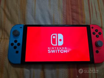 Nintendo Switch Oled + videogiochi e acessori