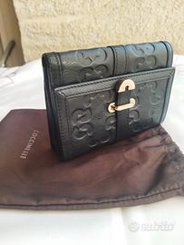 Portafoglio in pelle Coccinelle, linea "IDENTITY"