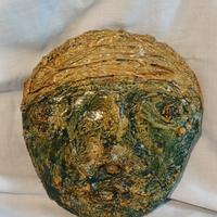 Maschera in terracotta dipinta