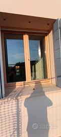Finestra doppia anta legno rovere lamellare 