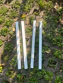 4 gambe / supporti bianchi per tavolo