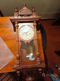 Orologio a pendolo da parete