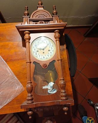 Orologio a pendolo da parete