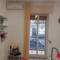 Stanza in studio condiviso