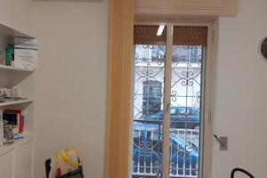 Stanza in studio condiviso