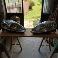 Coppia fari Fiat Grande Punto attacco bianco